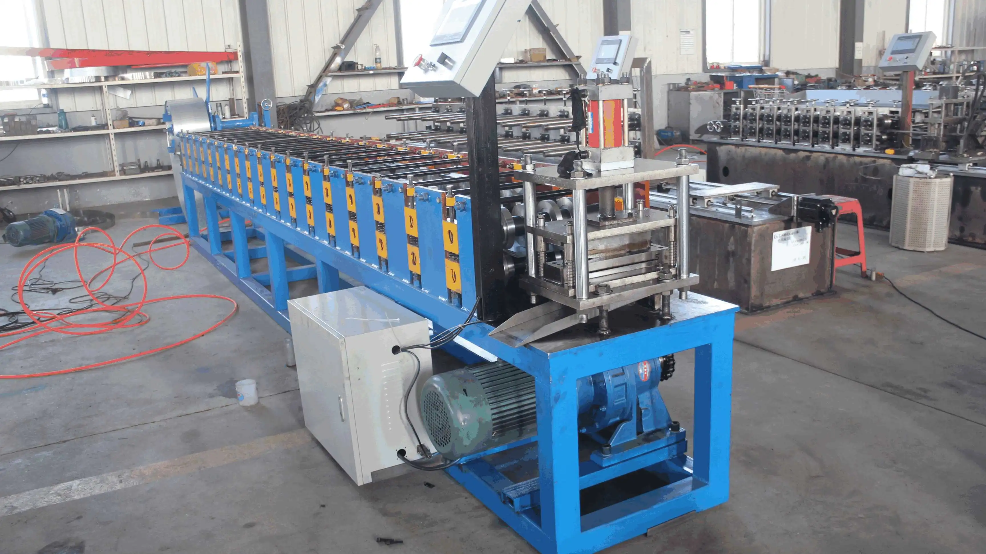 Standing Seam Roof Panel Machine or Rigid Frame Machine?